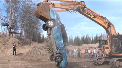 guy destroys building with mini excavator|Watch: Man smashes cars in excavator rampage .